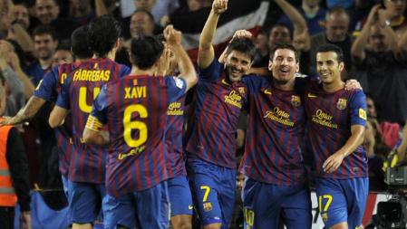Los jugadores del Barça celebran el gol de Messi ante el Atlético de Madrid