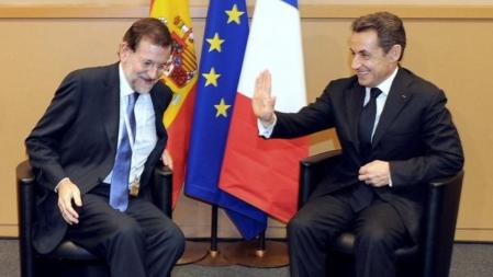 El presidente francés, Nicolas Sarkozy, y el futuro jefe del Ejecutivo español, Mariano Rajoy, se reúnen en Marsella en la cumbre del Partido Popular Europeo