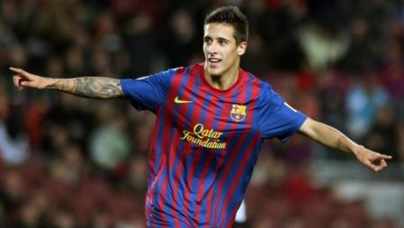 El centrocampista del F.C.Barcelona Cristian Tello celebra su gol, quinto de su equipo, ante L'Hospitalet C.E