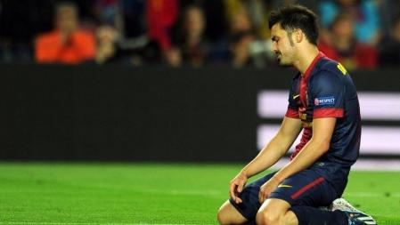 Villa se lamenta tras el gol en propia de Piqué