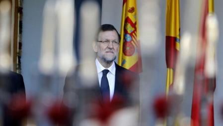 El presidente del Gobierno, Mariano Rajoy, durante el desfile del Día de la Fiesta Nacional, que ha contado con la participación de unos 2.600 militares y guardias civiles