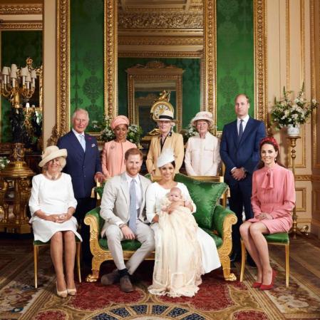 TOPSHOT - This official handout Christening photograph released by the Duke and Duchess of Sussex shows Britain's Prince Harry, Duke of Sussex (centre left), and his wife Meghan, Duchess of Sussex holding their baby son, Archie Harrison Mountbatten-Windsor flanked by (L-R) Britain's Camilla, Duchess of Cornwall, Britain's Prince Charles, Prince of Wales, Ms Doria Ragland, Lady Jane Fellowes, Lady Sarah McCorquodale, Britain's Prince William, Duke of Cambridge, and Britain's Catherine, Duchess of Cambridge in the Green Drawing Room at Windsor Castle, west of London on July 6, 2019. - Prince Harry and his wife Meghan had their baby son Archie christened on Saturday at a private ceremony. (Photo by Chris ALLERTON / SUSSEXROYAL / AFP) / XGTY / RESTRICTED TO EDITORIAL USE - MANDATORY CREDIT 