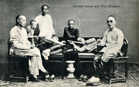 Real photo postcard features a group of opium smokers, Shanghai, China, circa 1910. (Photo by Transcendental Graphics/Getty Images)