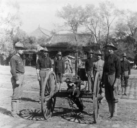 circa 1900:  The Ninth U.S. Infantry Gattling Gun Detachment stand around their guns in the Court of the Forbidden City during the Boxer Rebellion (1899-1901), Peking, China.  (Photo by Hulton Archive/Getty Images)