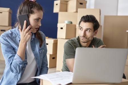 Couple having a problem while moving house