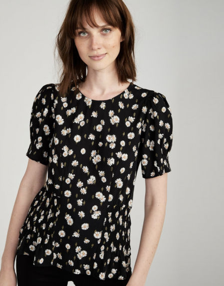 Camiseta con estampado de margaritas de Naf Naf (19,15 euros)