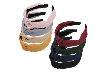 Pack de ocho diademas en colores neutros.