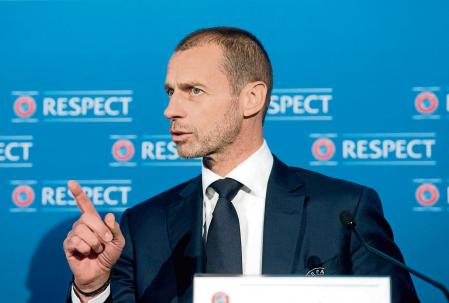 In this handout photograph released by UEFA, UEFA President Aleksander Ceferin addresses media representatives during a press conference following the UEFA Executive Committee meeting in Montreux on April 19, 2021. - Plans for a breakaway Super League announced by twelve of European football's most powerful clubs plunged European football into an unprecedented crisis, with threats of legal action and possible bans for players, as UEFA president Aleksander Ceferin called it a 