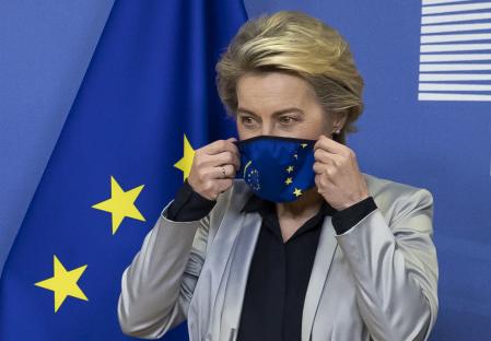 European Commission president Ursula von der Leyen wears a mask as she meets Britain's Prime Minister Boris Johnson in Brussels, Belgium, Wednesday Dec. 9, 2020. The political leaders are meeting in the hope of finalising a Brexit trade deal between Britain and the European bloc. (Aaron Chown/Pool via AP)