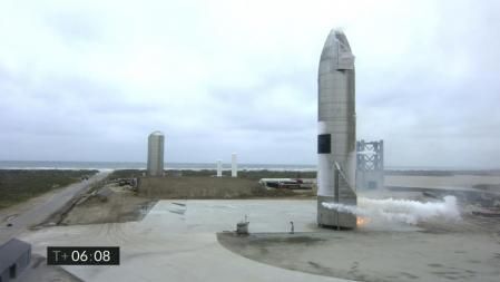 In this image from video made available by SpaceX, a Starship test vehicle sits on the ground after returning from a flight test in Boca Chica, Texas on Wednesday, May 5, 2021