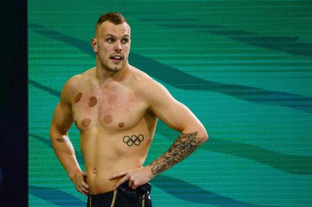 Kyle Chalmers reacts after winning the men's 200m freestyle final during day two of the Australian Olympic swimming trials in Adelaide on June 13, 2021. (Photo by Brenton Edwards / AFP) / -- IMAGE RESTRICTED TO EDITORIAL USE - STRICTLY NO COMMERCIAL USE --