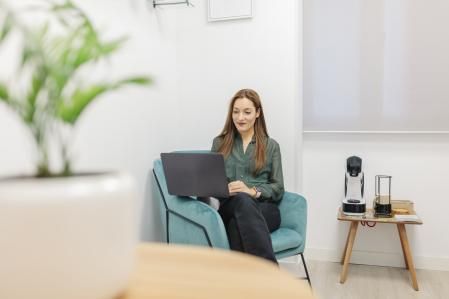 Madrid, Spain. Female psychologist with her patients in the office