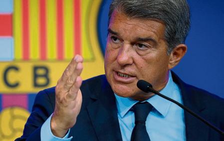 President of FC Barcelona Joan Laporta gestures during a press conference at the Camp Nou stadium in Barcelona on August 16, 2021. - Joan Laporta explains the economic results of Due Diligence. (Photo by LLUIS GENE / AFP)