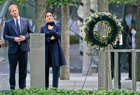Meghan Markle and Prince Harry pause while getting a tour of the National September 11 Memorial & Museum in New York, Thursday, Sept. 23, 2021. The Duke and Duchess of Sussex got a hawk's-eye view of New York City with a visit to the rebuilt World Trade Center's signature tower. (AP Photo/Seth Wenig)