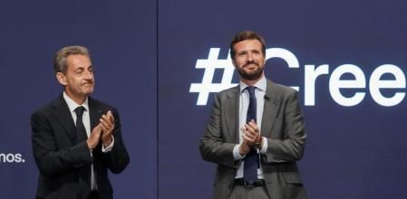 Pablo Casado, junto al ex presidente francés, Nicolas Sarkozy, en la convención del PP. (Tarek)
