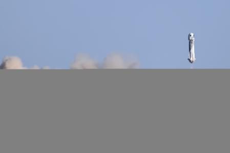 Blue Origin's rocket New Shepard blasts off carrying Star Trek actor William Shatner, 90, on billionaire Jeff Bezos's company's second suborbital tourism flight as part of a four-person crew near Van Horn, Texas, U.S., October 13, 2021. REUTERS/Mike Blake