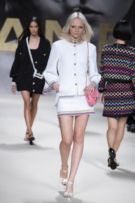 A model wears a creation for the Chanel collection during Paris Fashion Week 2021 , Tuesday, Oct. 5, 2021.