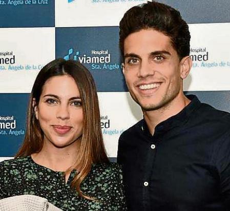 Soccerplayer Marc Bartra and Melissa Jimenez pose during the presentation of their son Max to the media in Sevilla on Monday , 28 October 2019
