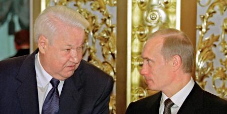 MOSCOW, RUSSIA:  Russian President Vladimir Putin (R) chats with the first President of Russia, Boris Yeltsin (L), during the State reception in Kremlin, devoted to the Day of Declaration of Sovereignty in Moscow, 12 June 2001. Vladimir Putin has signed a decree on awarding Boris Yeltsin with the order 