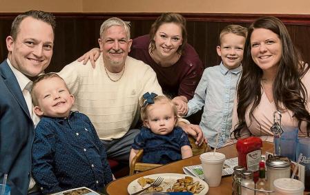 This photo provided by the family shows from left, David Bennett Jr., Preston Bennett, David Bennett Sr., Gillian Bennett, Nicole (Bennett) McCray, Sawyer Bennett, Kristi Bennett in 2019. In a medical first, doctors transplanted a pig heart into Bennett Sr., in a last-ditch effort to save his life and the hospital said Monday, Jan. 10, 2022 that he's doing well three days after the highly experimental surgery. (Byron Dillard via AP)