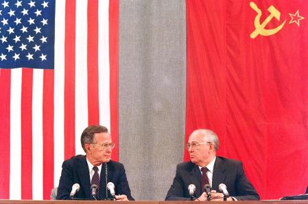 (FILES) This file photo taken on July 31, 1991, shows US President George Bush (L) and his Soviet counterpart Mikhail Gorbachev during a press conference in Moscow concluding the two-day US-Soviet Summit dedicated to the disarmament. - Former Soviet leader Mikhail Gorbachev said on Dember 24, 2021,  that Washington grew 