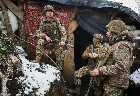 VERKHNOTORETSKE, UKRAINE - FEBRUARY 07: Today the trenches are quiet, as lot of days in this month, the Ukrainian Servicemen, war name Pinochet, 38 years-old, Bonehead, 21 years-old, and Godzilla, talk about their daily life, joke, and wait in case something happens at a frontline position held by Ukraine's 503rd Detached Marine Battalion on February 7, 2022 near Verkhnotoretske, Ukraine. Regional tensions remain high as Russia continues to amass soldiers and military equipment along its border with Ukraine, where large swaths of the Luhansk and Donetsk regions are held by Russian-backed separatists. Russia has also moved roughly 30,000 troops into Belarus, which borders Ukraine to the north. American and European officials say they do not whether Russian President Vladimir Putin has made a decision to invade Ukraine, but have issued a series of warnings about the country's assertive military posture. (Photo by Gaelle Girbes/Getty Images) *** BESTPIX ***