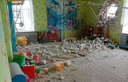 This handout photograph taken and released on February 17, 2022 by the Ukrainian Joint Forces Operation press service, shows debris after the reported shelling of a kindergarten in the settlement of Stanytsia Luhanska, Ukraine. - U.S. Defense Secretary Lloyd Austin warned on February 17, 2022, of a provocation by Moscow to justify military intervention in Ukraine after 