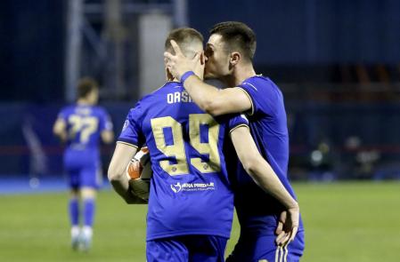 Zagreb (Croatia), 24/02/2022.- Mislav Orsic (L) of GNK Dinamo celebrates with teammate Amer Gojak (R) after scoring the 1-0 lead from the penalty spot during the UEFA Europa league Play-off second leg soccer match between GNK Dinamo Zagreb and Sevilla FC in Zagreb, Croatia, 24 February 2022. (Croacia) EFE/EPA/ANTONIO BAT