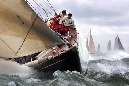 Sir Thomas Lipton's famous J class yacht Shamrock V and Endeavour (R) pound through heavy seas in the Solent off Cowes, on the first day of racing at the America's Cup Jubilee.   (Photo by Chris Ison - PA Images/PA Images via Getty Images)