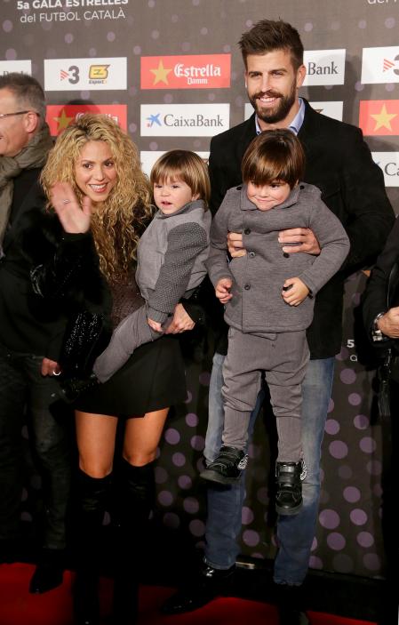 La pareja con sus dos hijos, Milan y Sasha, en el 2016