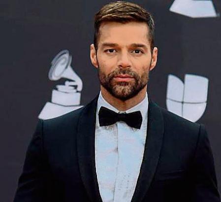 (FILES) In this file photo taken on November 14, 2019 Puerto Rican musician and host Ricky Martin arrives at the 20th Annual Latin Grammy Awards in Las Vegas, Nevada. - Police in San Juan, Puerto Rico, reported Saturday that a judge has issued a restraining order against superstar Ricky Martin. (Photo by Bridget BENNETT / AFP)