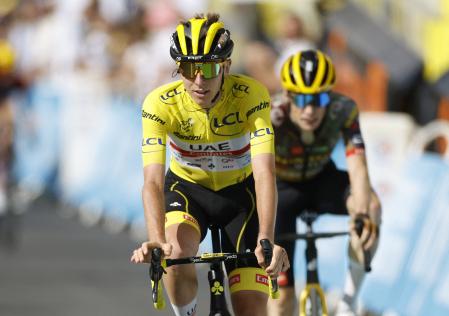 Cycling - Tour de France - Stage 9 - Aigle to Chatel les Portes du Soleil - France - July 10, 2022 Uae Team Emirates' Tadej Pogacar crosses the finish line after stage 9 REUTERS/Gonzalo Fuentes