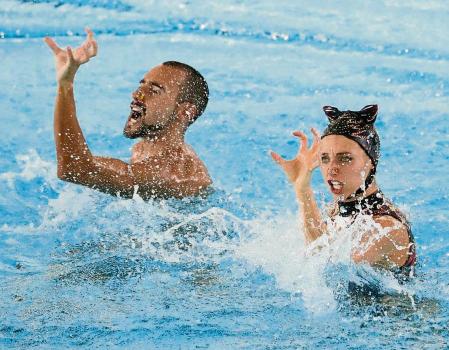 Spain's Emma Garcia Garcia and Pau Ribes Culla compete during the mixed duet free final at the European swimming championships, in Rome, Saturday, Aug. 13, 2022. (AP Photo/Andrew Medichini)