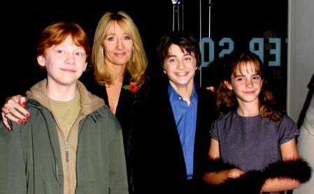 LONDON - NOVEMBER 4:  (L to R) Rupert Grint (Ron Weasley), author J.K. Rowling, Daniel Radcliffe (Harry Potter) and Emma Watson (Hermione Granger) attend the world film premiere of 