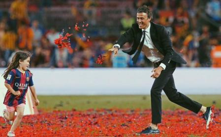 Luis Enrique celebrando un título con su hija Xana