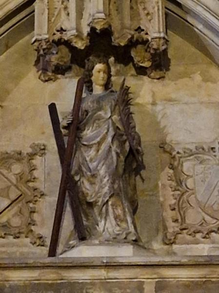 Imagen de Santa Eulàlia en el portal del claustro de la Catedral.