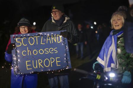 EDINBURGH, SCOTLAND - JANUARY 31: Anti-Brexit campaigners take part in a torchlight procession to the Scottish Parliament on the third anniversary of Brexit on January 31, 2023 in Edinburgh, Scotland. January 31 2023 marks the 3rd anniversary of Brexit when the UK left the European Union after a referendum vote of the British people returned a result to leave by 52% to 48%. (Photo by Jeff J Mitchell/Getty Images)