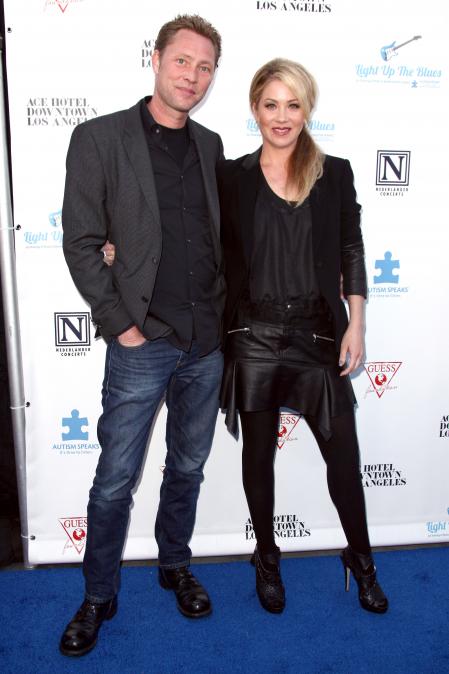 Con su marido, el músico Martyn LeNoble, en el 2014