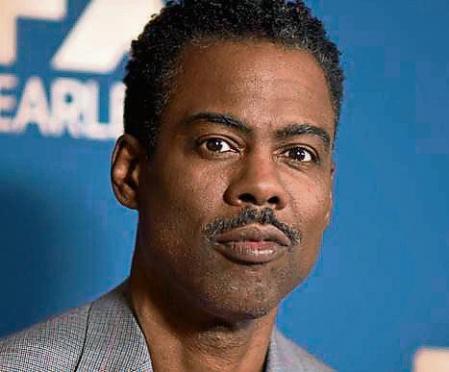 FILE - Chris Rock appears at the Television Critics Association Winter press tour in Pasadena, Calif., on Jan. 9, 2020. Rock will be the first artist to perform on Netflix's first-ever live, global streaming event. (Photo by Richard Shotwell/Invision/AP, File)