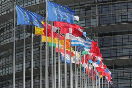 STRASBOURG, FRANCE - MAY 11: Flags of the European Union fly outside the European Parliament on May 11, 2016 in Strasbourg, France. The United Kingdom will hold a referendum on June 23, 2016 to decide whether or not to remain a member of the European Union (EU), an economic and political partnership involving 28 European countries, which allows members to trade together in a single market and provide free movement across it's borders for cirtizens. (Photo by Christopher Furlong/Getty Images)