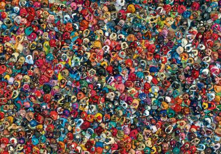 FILE - Hindu devotees listen to a religious leader at the Sangam, the confluence of the Ganges, Yamuna and mythical Saraswati rivers, during the annual traditional fair of Magh Mela festival, in Prayagraj, in the northern Indian state of Uttar Pradesh, Jan. 31, 2023. India is on track to become the world's most populous nation, surpassing China by 2.9 million people by mid-2023, according to data released by the United Nations on Wednesday. The South Asian country will have an estimated 1.4286 billion people against China's 1.4257 billion by the middle of the year, according to U.N. projections. (AP Photo/Rajesh Kumar Singh, File)