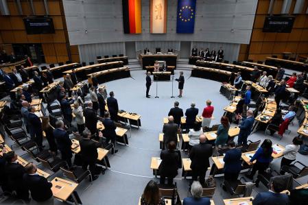 Kai Wegner (L), leader of the regional conservative Christian Democratic Union (CDU) and new mayor of Berlin is sworn in by Cornelia Seibeld (R), president of Berlin's parliament after being elected in the third round of voting at Berlin's House of Deputies (Abgeordnetenhaus), seat of the regional parliament, on April 27, 2023. - Berlin is set to get its first conservative mayor in more than two decades after the city's Christian Democrats (CDU) presented a coalition agreement with the Social Democrats (SPD). The conservatives topped the polls in a rerun election in February 2023 after the chaotic initial vote in 2021 was found not to meet basic procedural standards. (Photo by Tobias SCHWARZ / AFP)