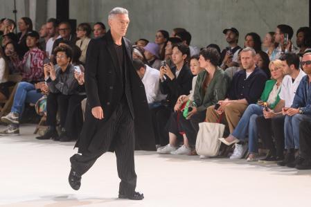 Actor Vincent Cassel wears Ami Alexandre Mattiussi Menswear collection during Paris Fashion Week on June 22, 2023 in Paris, France.