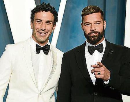 FILE - Jwan Yosef, left, and Ricky Martin appear at the Vanity Fair Oscar Party in Beverly Hills, Calif., on March 27, 2022. (Photo by Evan Agostini/Invision/AP, File)