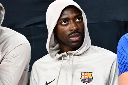 Barcelona's French midfielder Ousmane Dembele looks on ahead of the pre-season friendly football match between AC Milan and FC Barcelona, at Allegiant Stadium in Las Vegas, Nevada, on August 1, 2023. FC Barcelona have already agreed to sell Ousmane Dembele to Paris Saint-Germain, according to Mundo Deportivo. The Catalan outlet reports that sources at the club have admitted to this them, and it now remains to be seen when the two European giants will make the move official through an announcement. (Photo by Patrick T. Fallon / AFP)