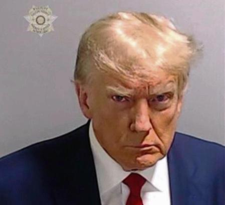 TOPSHOT - This handout image released by the Fulton County Sheriff's Office on August 24, 2023 shows the booking photo of former US President Donald Trump. Former US president Donald Trump was photographed for a police mug shot after his arrest on August 24 at the Fulton County Jail in Georgia, multiple US media outlets reported citing local officials. The picture, which has yet to be released, is set to become a world-famous image as Trump fights multiple criminal cases at the same time as running to regain the White House in next year's election. (Photo by FULTON COUNTY SHERIFF'S OFFICE / AFP) / RESTRICTED TO EDITORIAL USE - MANDATORY CREDIT 