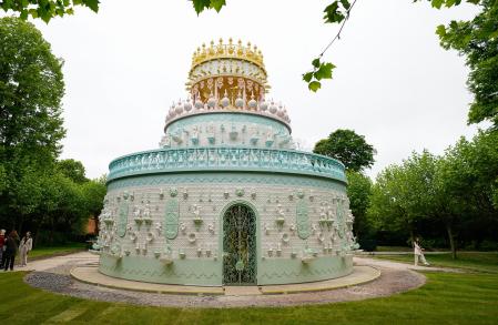 A view of Portuguese artist Joana Vasconcelos' new installation Wedding Cake at Waddesdon Manor in Aylesbury, Buckinghamshire. The 12-metre-high sculptural pavilion in the form of a three-tiered wedding cake is clad in ceramic tiles and was comissioned by the Rothschild Foundation for Waddesdon. Picture date: Tuesday June 6, 2023. (Photo by Andrew Matthews/PA Images via Getty Images)