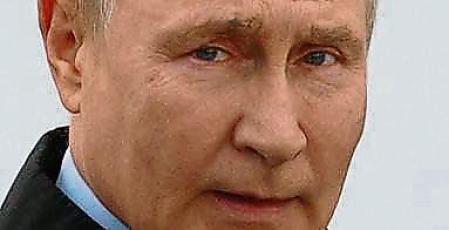 This pool image distributed by Sputnik agency shows Russian President Vladimir Putin (R) visiting the Resurrection cathedral with Metropolitan Georgy (R) of Nizhny Novgorod and Arzamas and Nizhny Novgorod Region Governor Gleb Nikitin (C), in Arzamas on September 8, 2023. (Photo by Sergei BOBYLYOV / POOL / AFP)