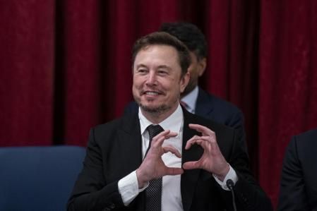 Elon Musk, chief executive officer of Tesla, makes a heart with his hands during a Senate bipartisan Artificial Intelligence (AI) Insight Forum on Capitol Hill in Washington, DC, US, on Wednesday, Sept. 13, 2023. The gathering is part of the Senate majority leader's strategy to give Congress more influence over the future of artificial intelligence as it takes on a growing role in the professional and personal lives of Americans. Photographer: Al Drago/Bloomberg