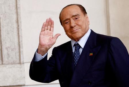 FILE PHOTO: FILE PHOTO: Forza Italia leader and former Prime Minister Silvio Berlusconi arrives for a meeting with Italian President Sergio Mattarella at the Quirinale Palace in Rome, Italy October 21, 2022. REUTERS/Guglielmo Mangiapane/File Photo/File Photo